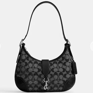 Coach Hamptons Hobo Bag
In Crystal Signature Jacquard Purse